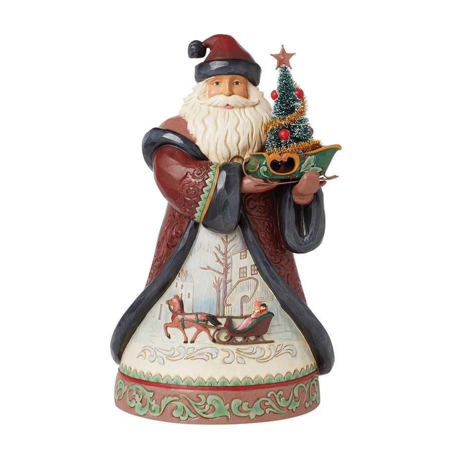 Jim Shore Heartwood Creek: Holiday Manor Santa Holding Small Sleigh and Sisal Tree Figurine sparkle-castle
