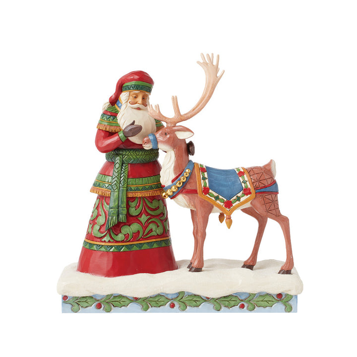 Jim Shore Heartwood Creek: 17th Annual Laplander Santa Standing With Reindeer Figurine sparkle-castle