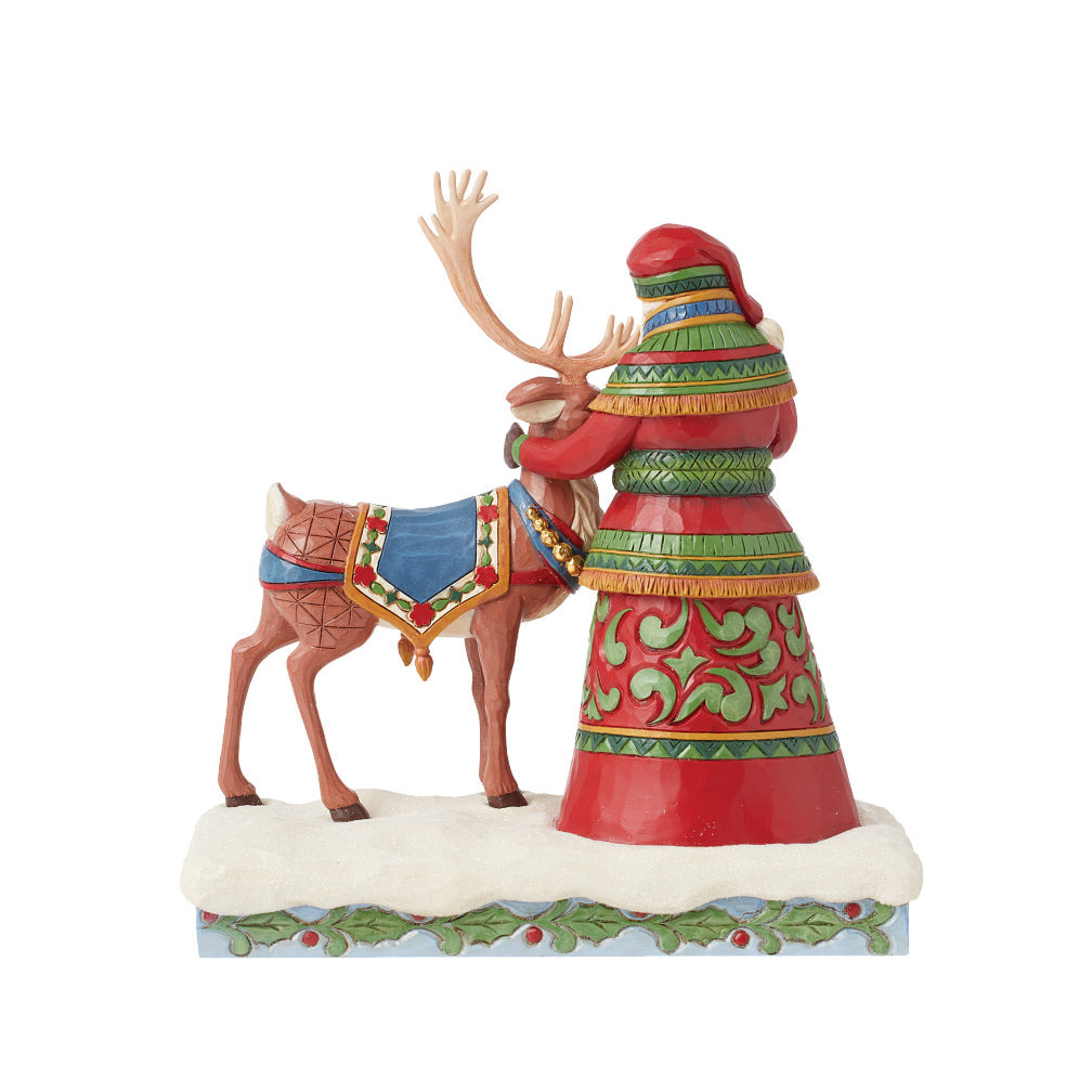Jim Shore Heartwood Creek: 17th Annual Laplander Santa Standing With Reindeer Figurine sparkle-castle