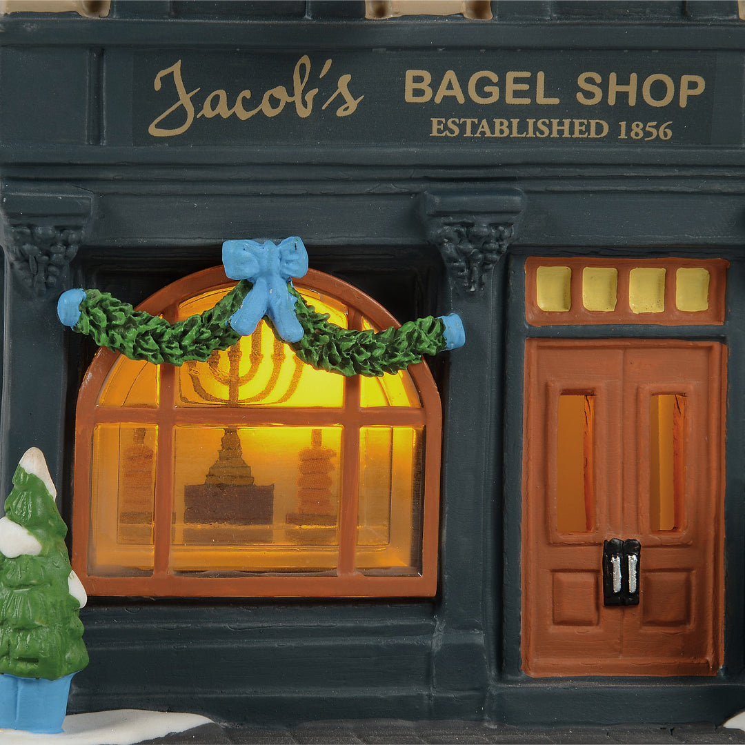 Department 56 Christmas in the City Village: Jacob's Bagel Shop sparkle-castle