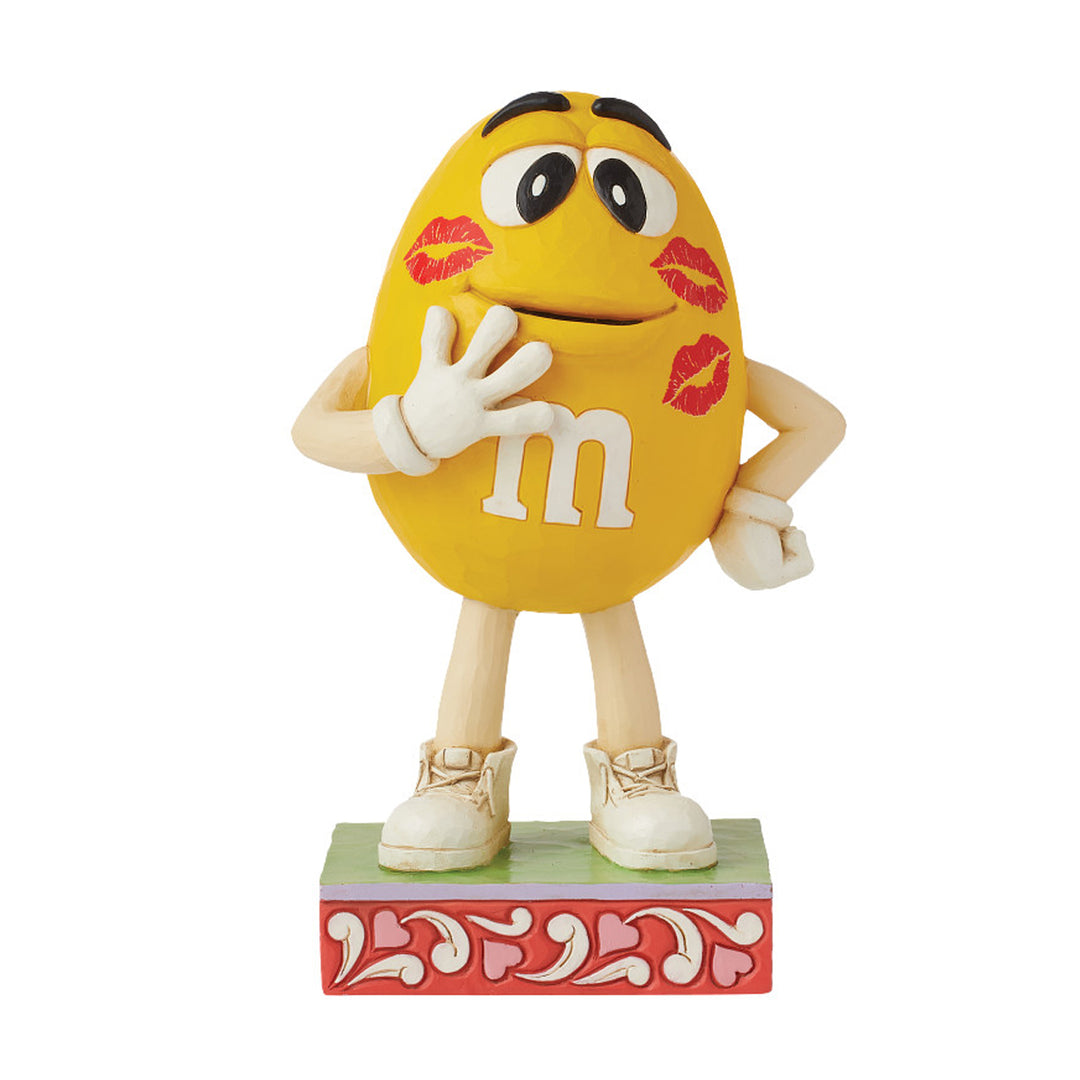 Jim Shore M&M'S: Yellow M&M With Lipstick Kisses Figurine sparkle-castle