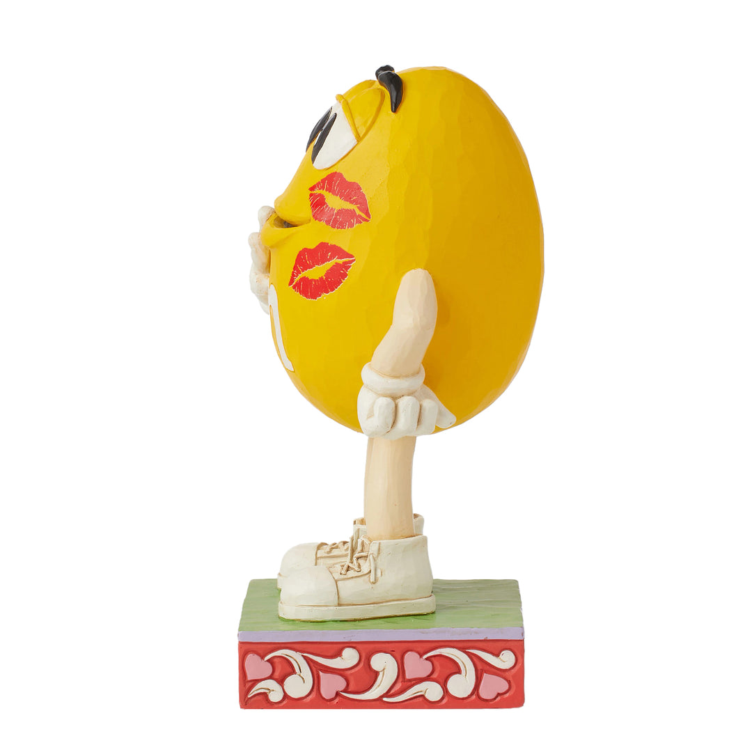 Jim Shore M&M'S: Yellow M&M With Lipstick Kisses Figurine sparkle-castle