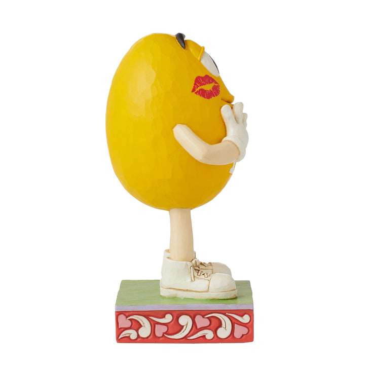 Jim Shore M&M'S: Yellow M&M With Lipstick Kisses Figurine sparkle-castle