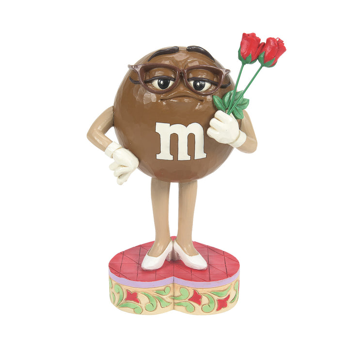 Jim Shore M&M'S: Brown M&M Holding Roses Figurine sparkle-castle