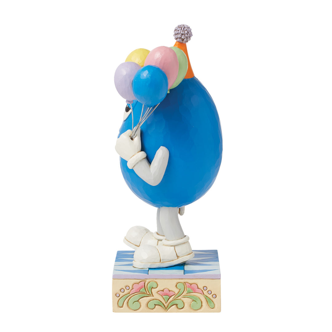 Jim Shore M&M'S: Blue M&M Holding Birthday Balloons Figurine sparkle-castle