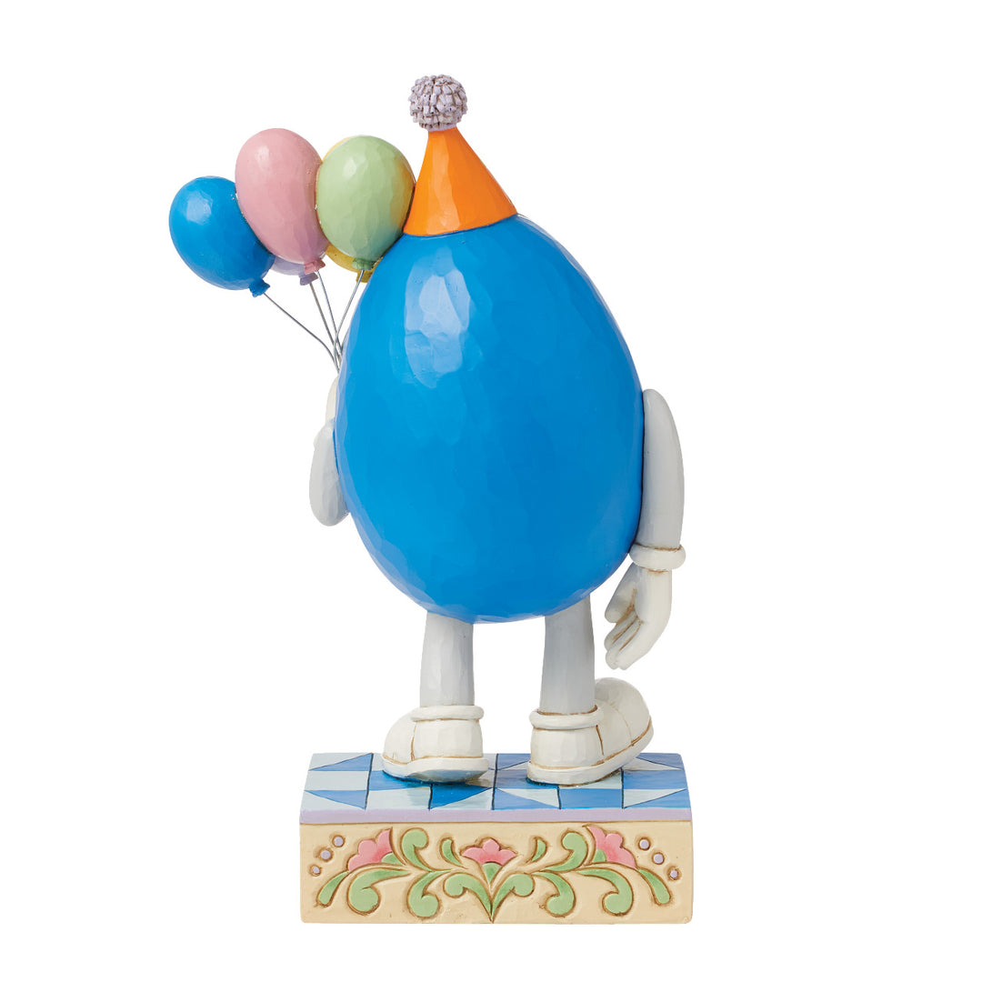 Jim Shore M&M'S: Blue M&M Holding Birthday Balloons Figurine sparkle-castle