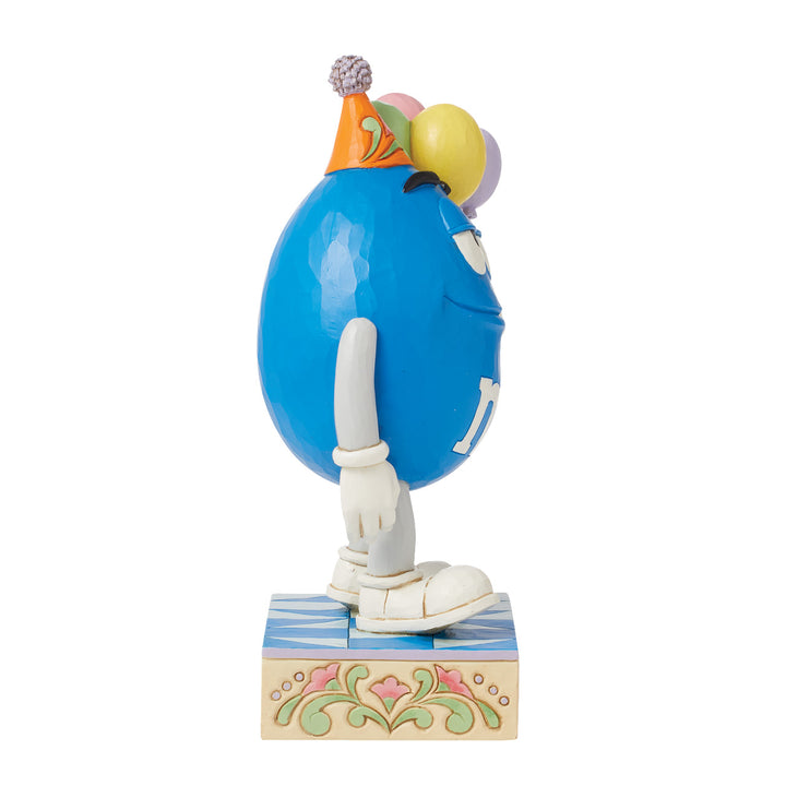 Jim Shore M&M'S: Blue M&M Holding Birthday Balloons Figurine sparkle-castle