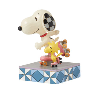 Jim Shore Peanuts: Snoopy & Woodstock Rollerskating Figurine sparkle-castle