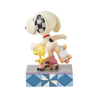 Jim Shore Peanuts: Snoopy & Woodstock Rollerskating Figurine sparkle-castle