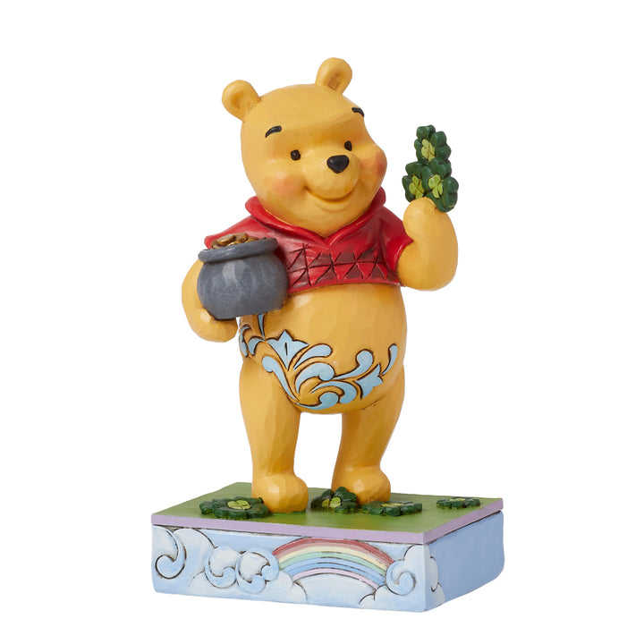 Jim Shore Disney Traditions: Pooh With Clover and Pot of Gold Figurine sparkle-castle