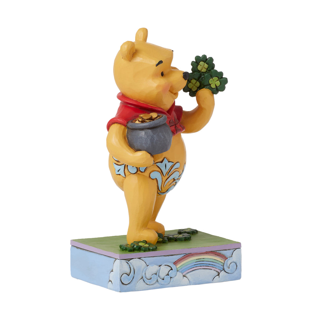 Jim Shore Disney Traditions: Pooh With Clover and Pot of Gold Figurine sparkle-castle