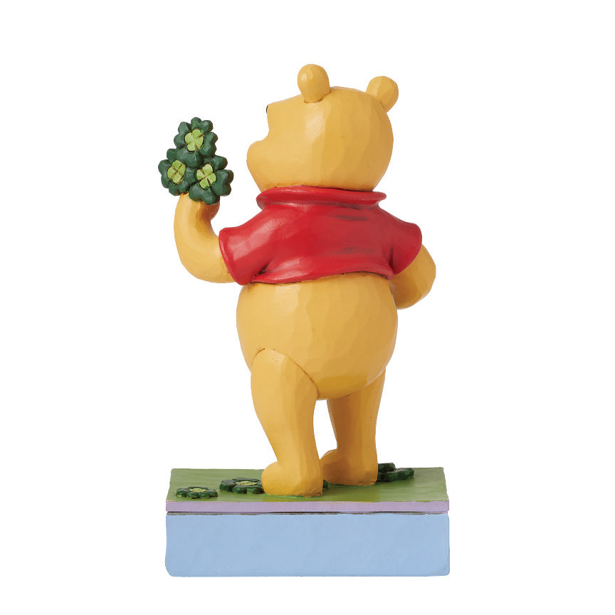 Jim Shore Disney Traditions: Pooh With Clover and Pot of Gold Figurine sparkle-castle