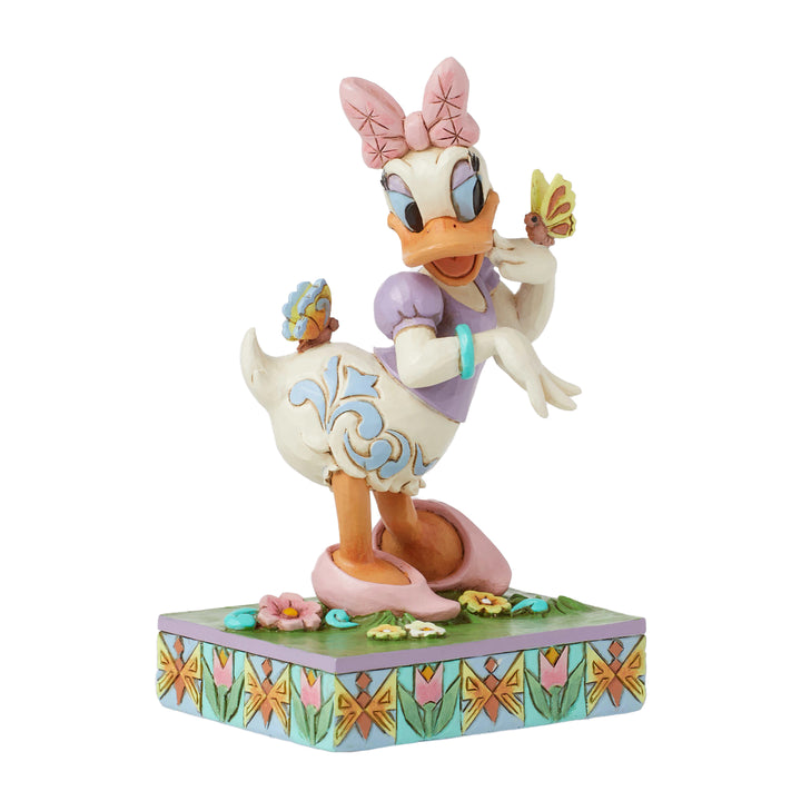 Jim Shore Disney Traditions: Daisy Duck With Butterflies Figurine sparkle-castle