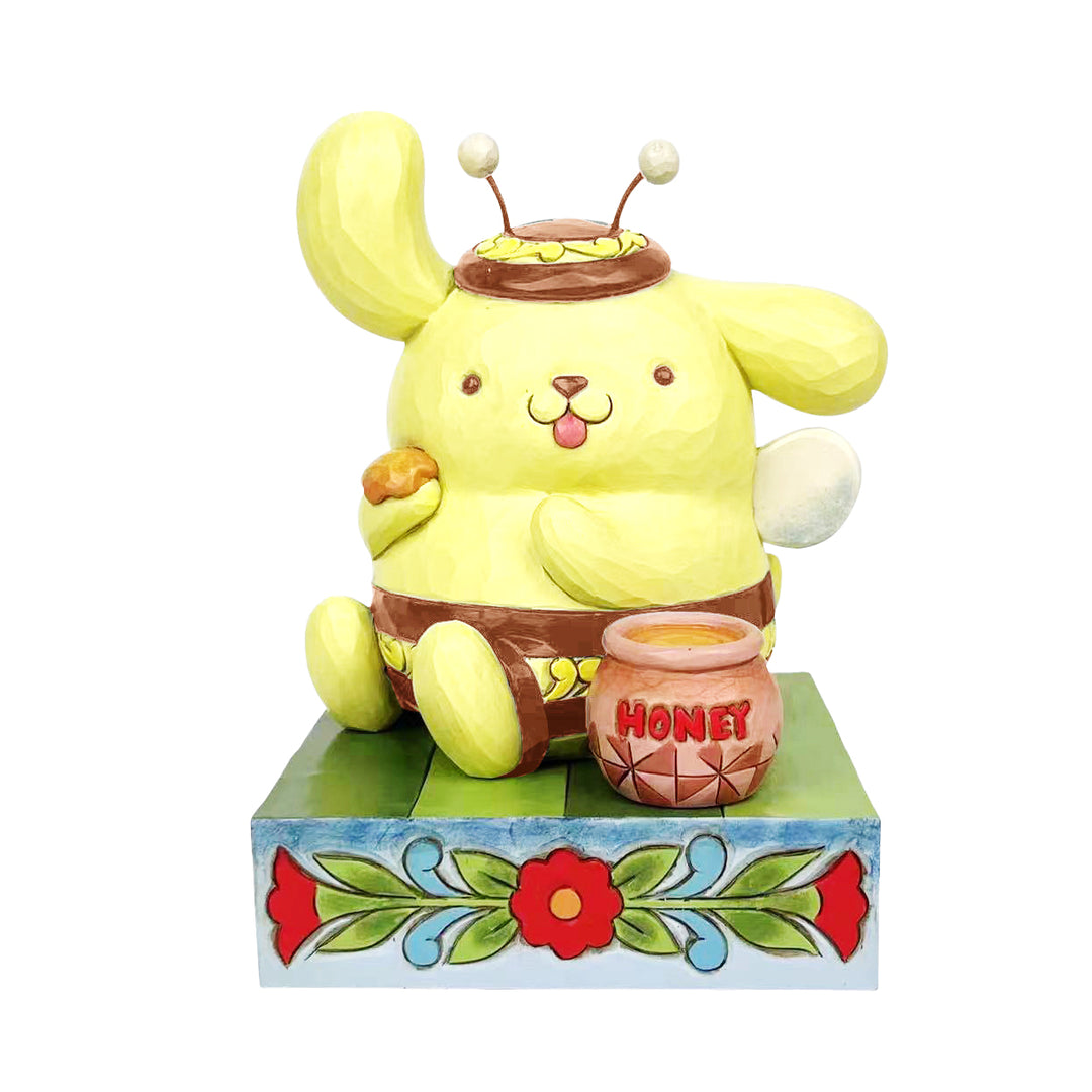 Jim Shore Sanrio: Pompompurin Bumble Bee Figurine sparkle-castle