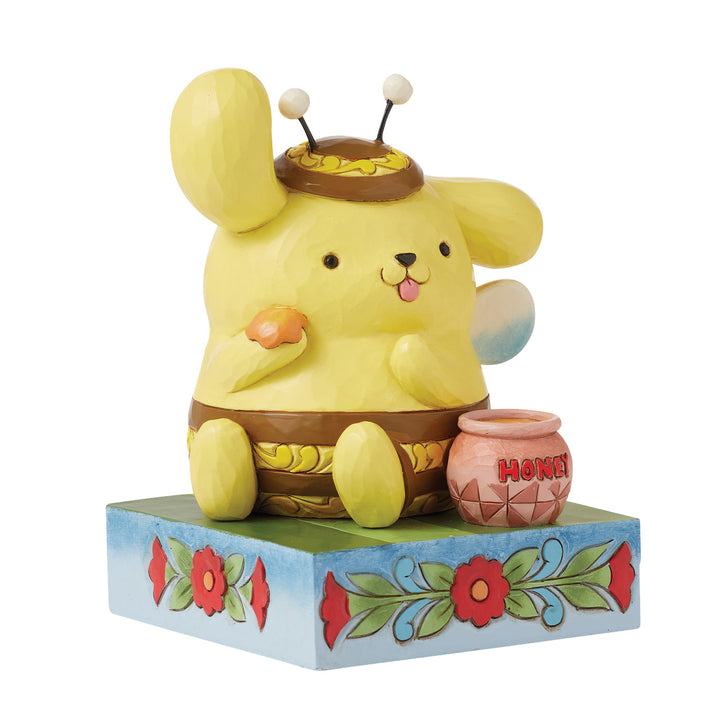 Jim Shore Sanrio: Pompompurin Bumble Bee Figurine sparkle-castle