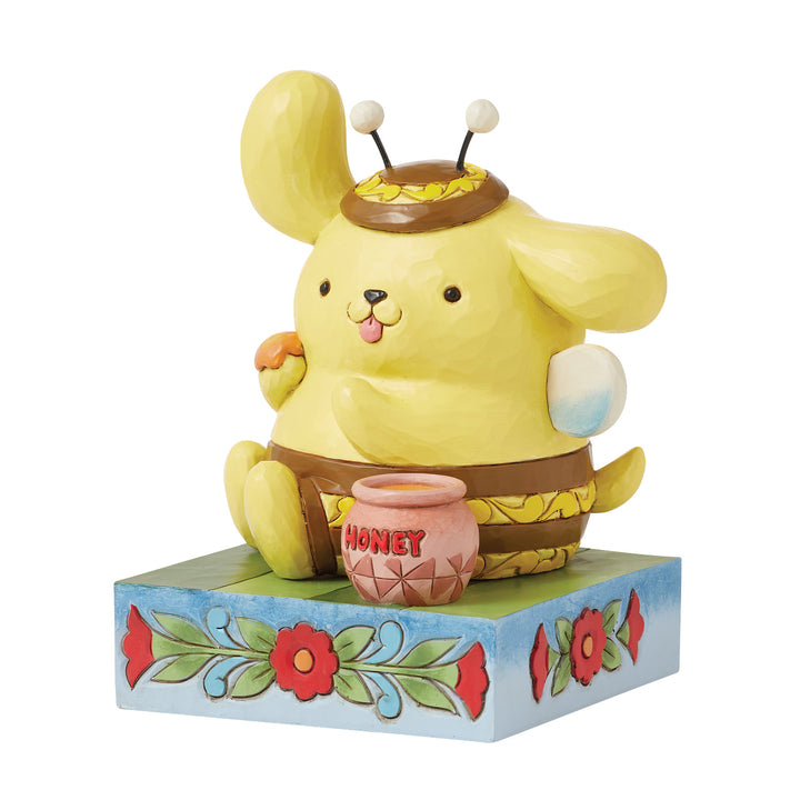 Jim Shore Sanrio: Pompompurin Bumble Bee Figurine sparkle-castle