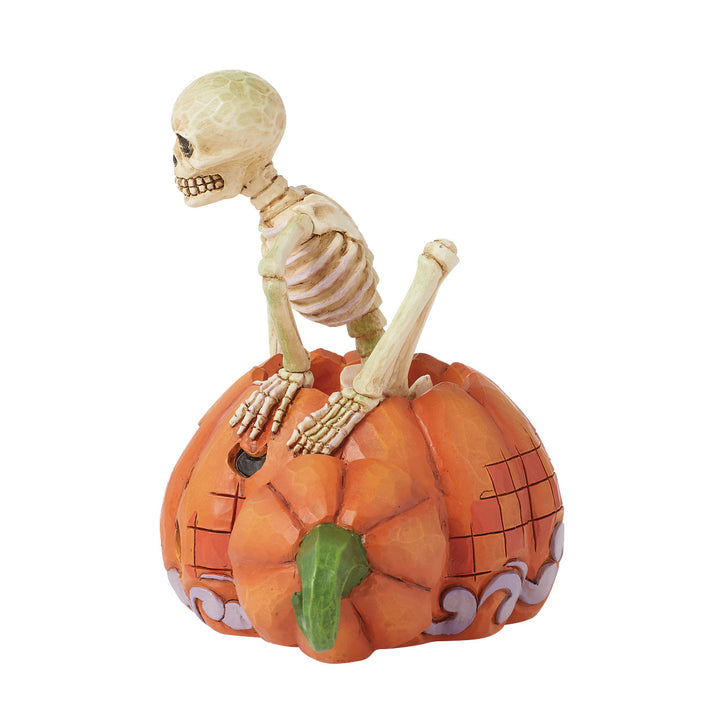 Jim Shore Heartwood Creek: Skeleton Stepping Out of Pumpkin Figurine sparkle-castle