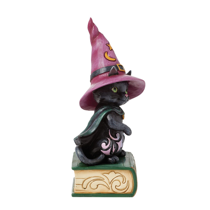 Jim Shore Heartwood Creek: Black Cat Sitting on a Book of Spells Figurine sparkle-castle