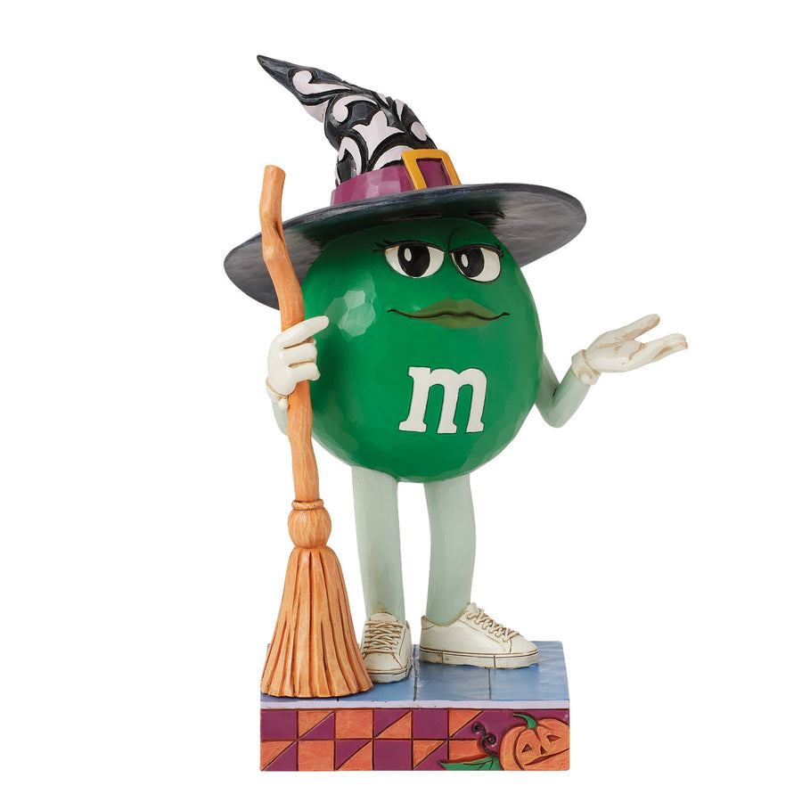 Jim Shore M&M'S: Green M&M Witch With Broom Figurine sparkle-castle