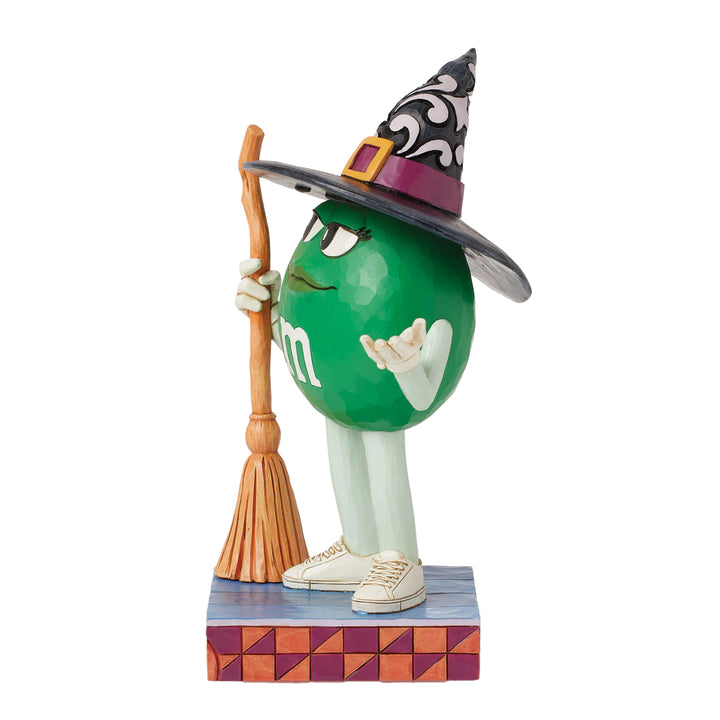 Jim Shore M&M'S: Green M&M Witch With Broom Figurine sparkle-castle