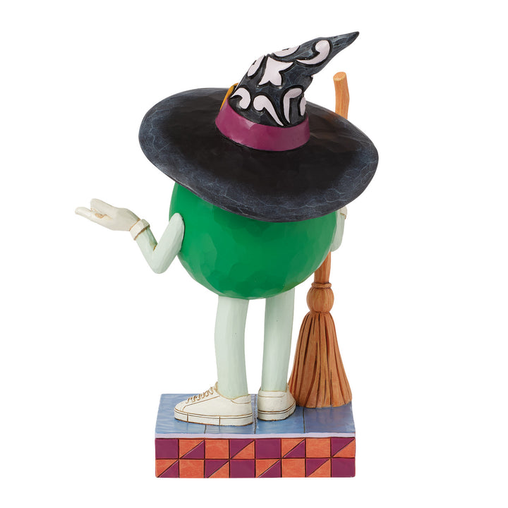 Jim Shore M&M'S: Green M&M Witch With Broom Figurine sparkle-castle