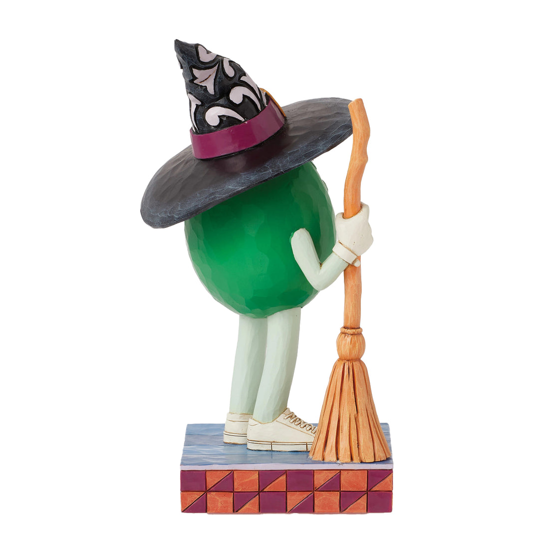 Jim Shore M&M'S: Green M&M Witch With Broom Figurine sparkle-castle