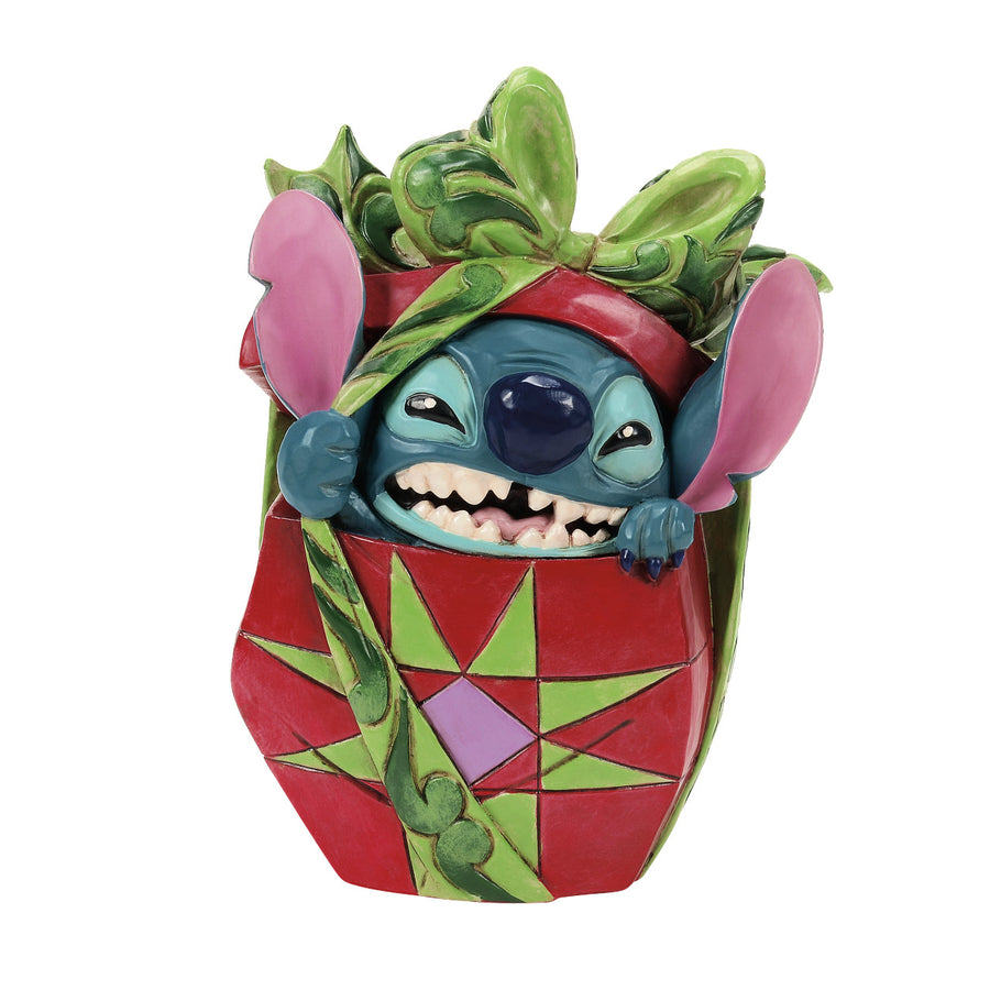 Jim Shore Disney Traditions: Stitch Tearing Present Figurine sparkle-castle