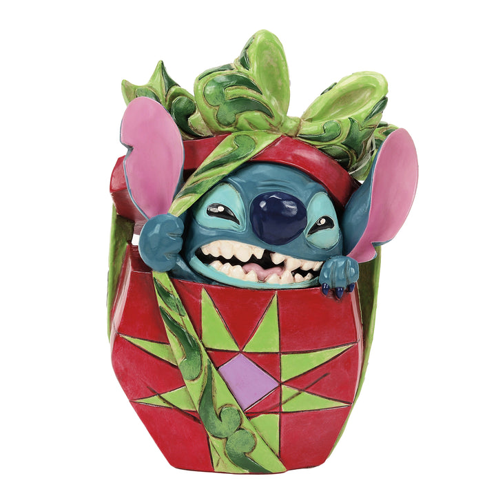 Jim Shore Disney Traditions: Stitch Tearing Present Figurine sparkle-castle