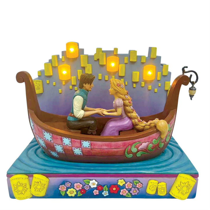 Jim Shore Disney Traditions: Rapunzel In Boat With LED Lantern Figurine sparkle-castle