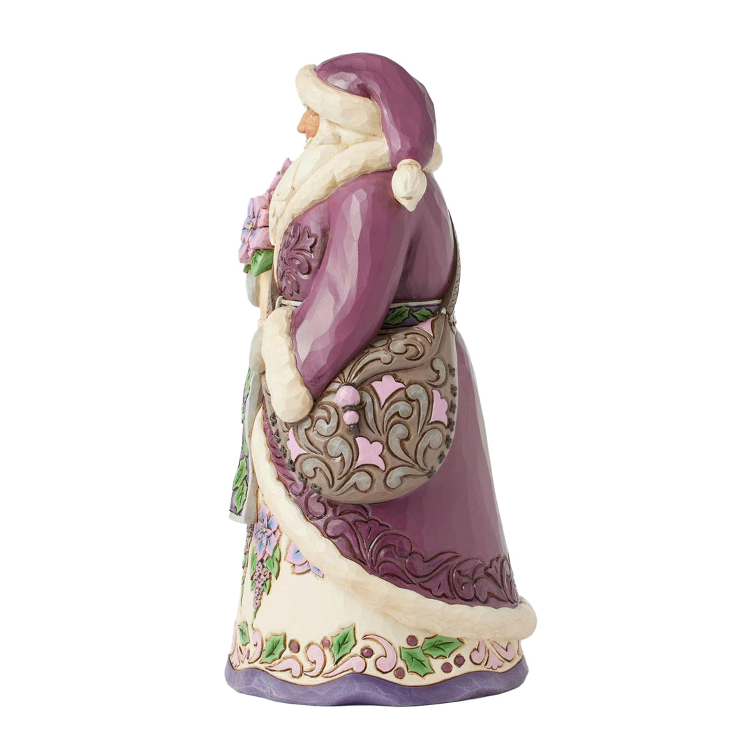 Jim Shore Heartwood Creek: Purple Santa Holding Poinsettias Figurine sparkle-castle