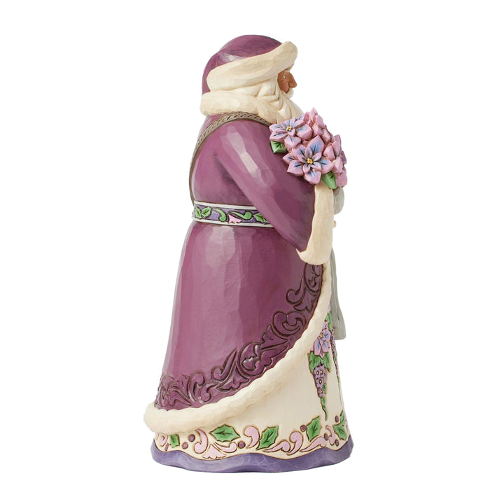 Jim Shore Heartwood Creek: Purple Santa Holding Poinsettias Figurine sparkle-castle