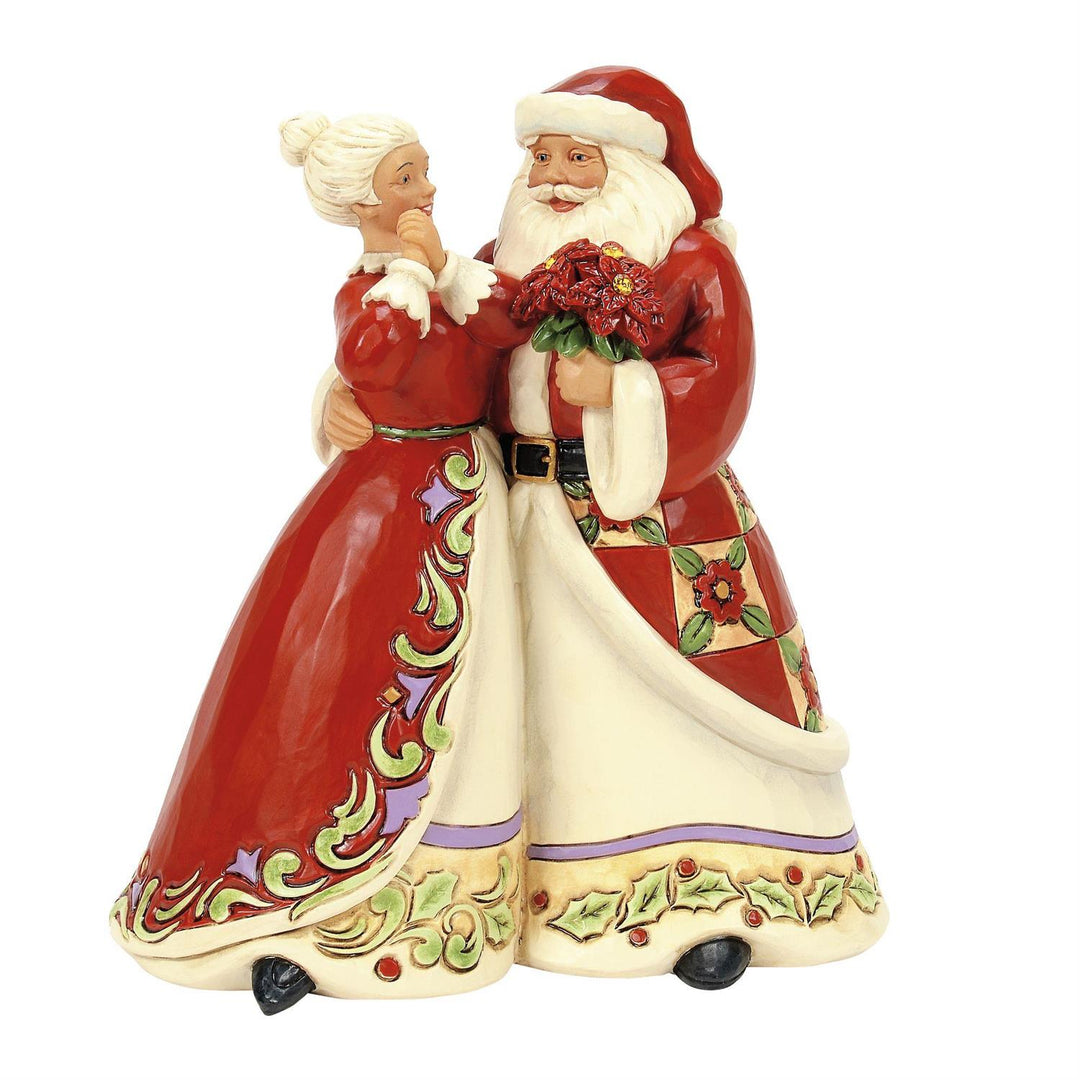 Jim Shore Heartwood Creek: Santa and Mrs Claus Figurine sparkle-castle