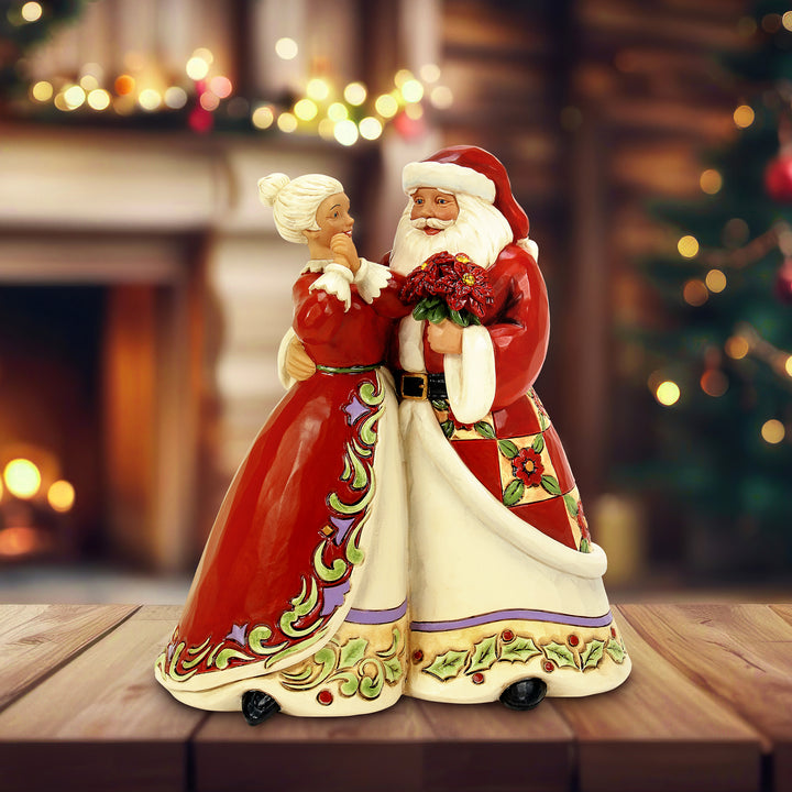 Jim Shore Heartwood Creek: Santa and Mrs Claus Figurine sparkle-castle