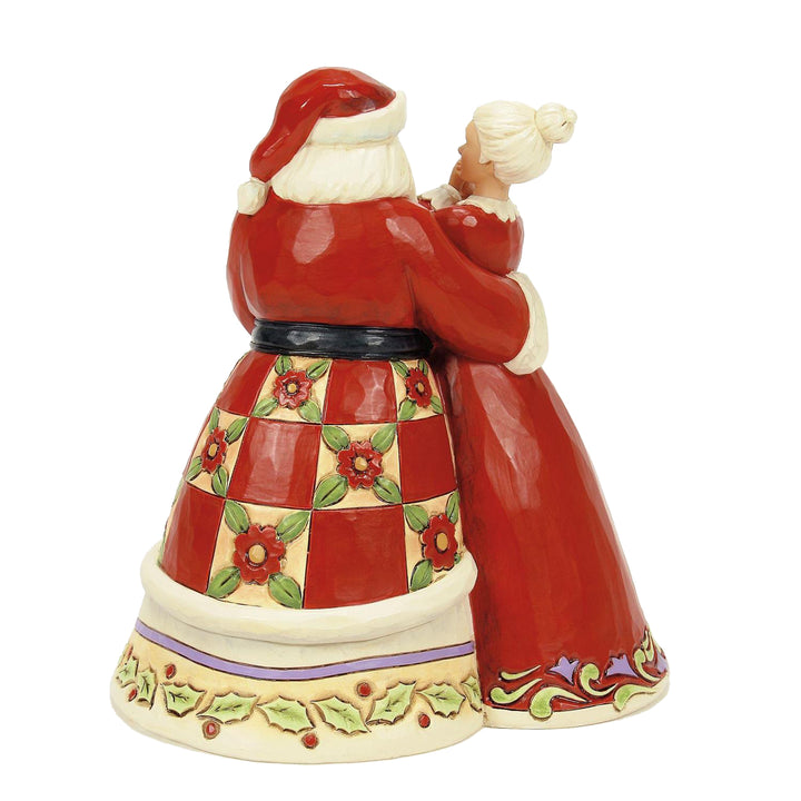 Jim Shore Heartwood Creek: Santa and Mrs Claus Figurine sparkle-castle