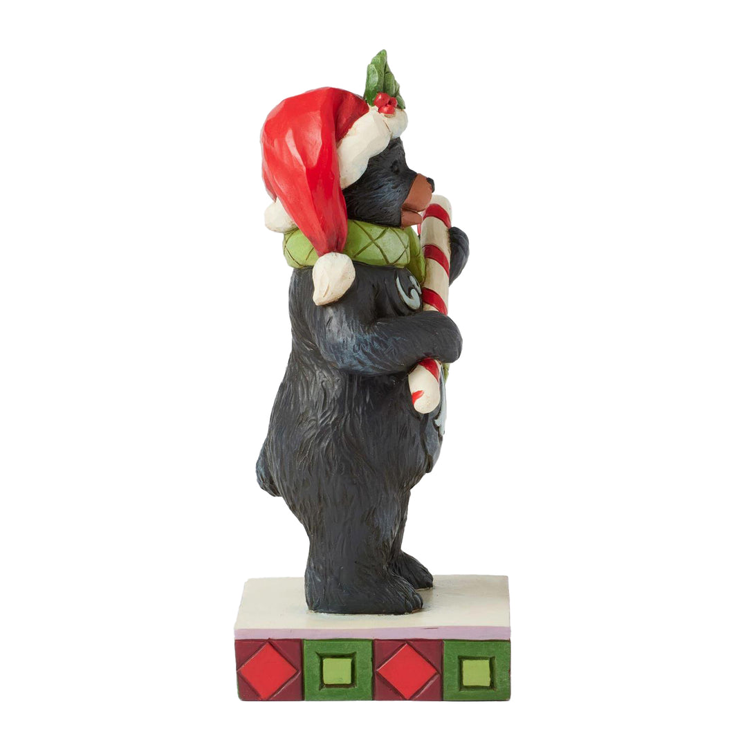 Jim Shore Heartwood Creek: Christmas at the Lodge Black Bear Holding Candy Cane Figurine sparkle-castle