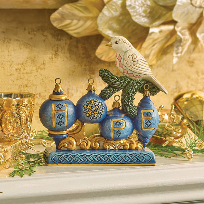 Jim Shore Heartwood Creek: Blue & Gold Hope with Dove Figurine sparkle-castle