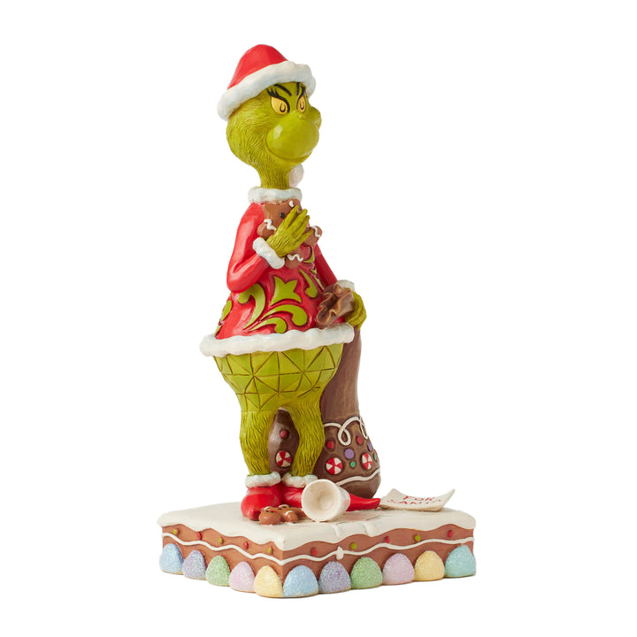 Jim Shore The Grinch: Grinch Eating Gingerbread Figurine sparkle-castle