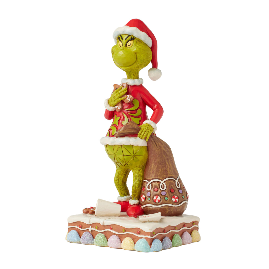 Jim Shore The Grinch: Grinch Eating Gingerbread Figurine sparkle-castle