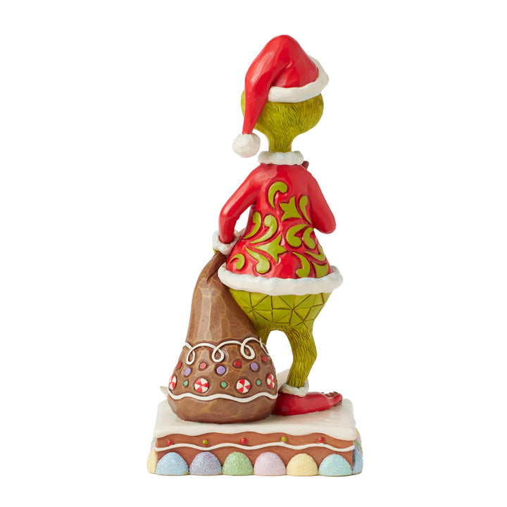 Jim Shore The Grinch: Grinch Eating Gingerbread Figurine sparkle-castle