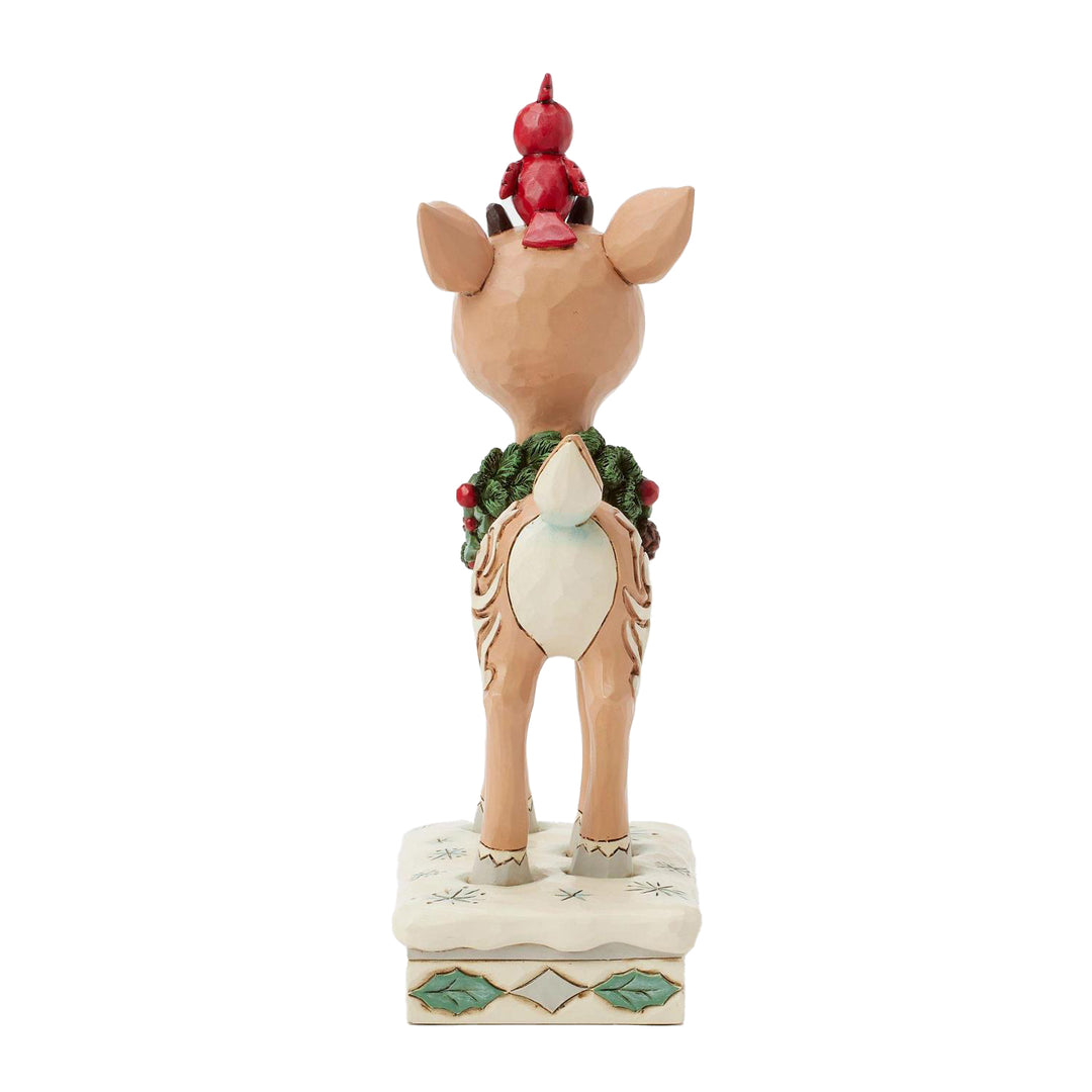 Jim Shore Rudolph Traditions: White Woodland Rudolph with Red Bird Figurine sparkle-castle