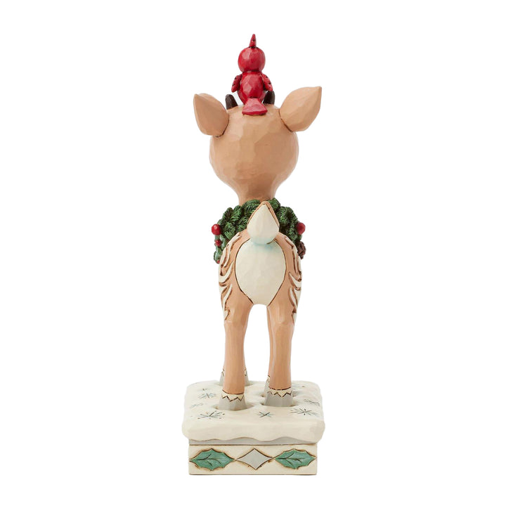 Jim Shore Rudolph Traditions: White Woodland Rudolph with Red Bird Figurine sparkle-castle