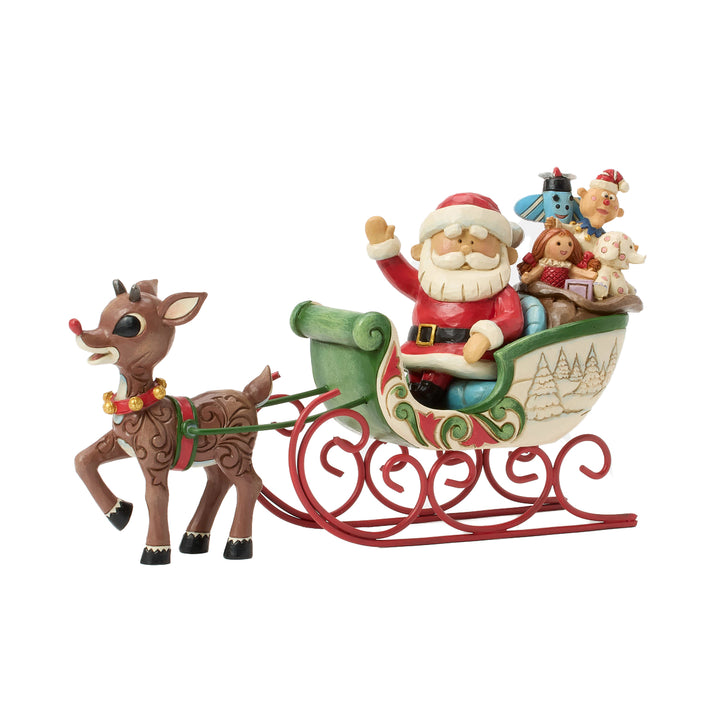 Jim Shore Rudolph Traditions: Rudolph Pulling Santa's Sleigh Figurine sparkle-castle