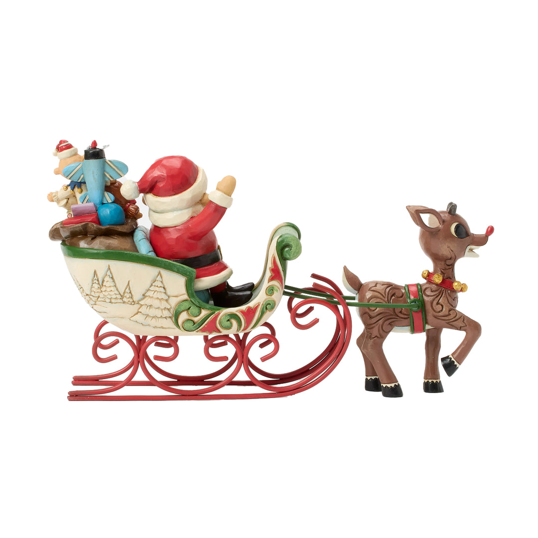 Jim Shore Rudolph Traditions: Rudolph Pulling Santa's Sleigh Figurine sparkle-castle