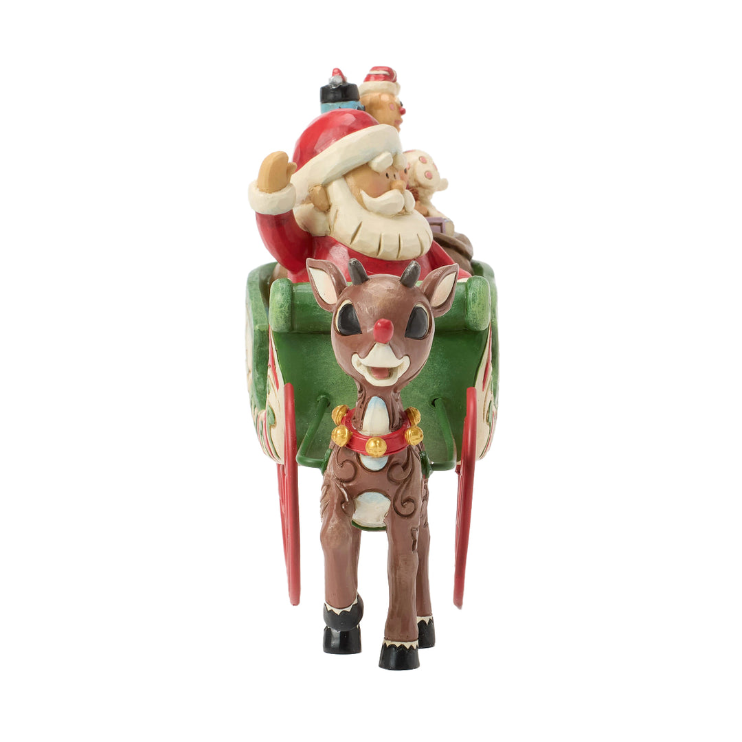 Jim Shore Rudolph Traditions: Rudolph Pulling Santa's Sleigh Figurine sparkle-castle