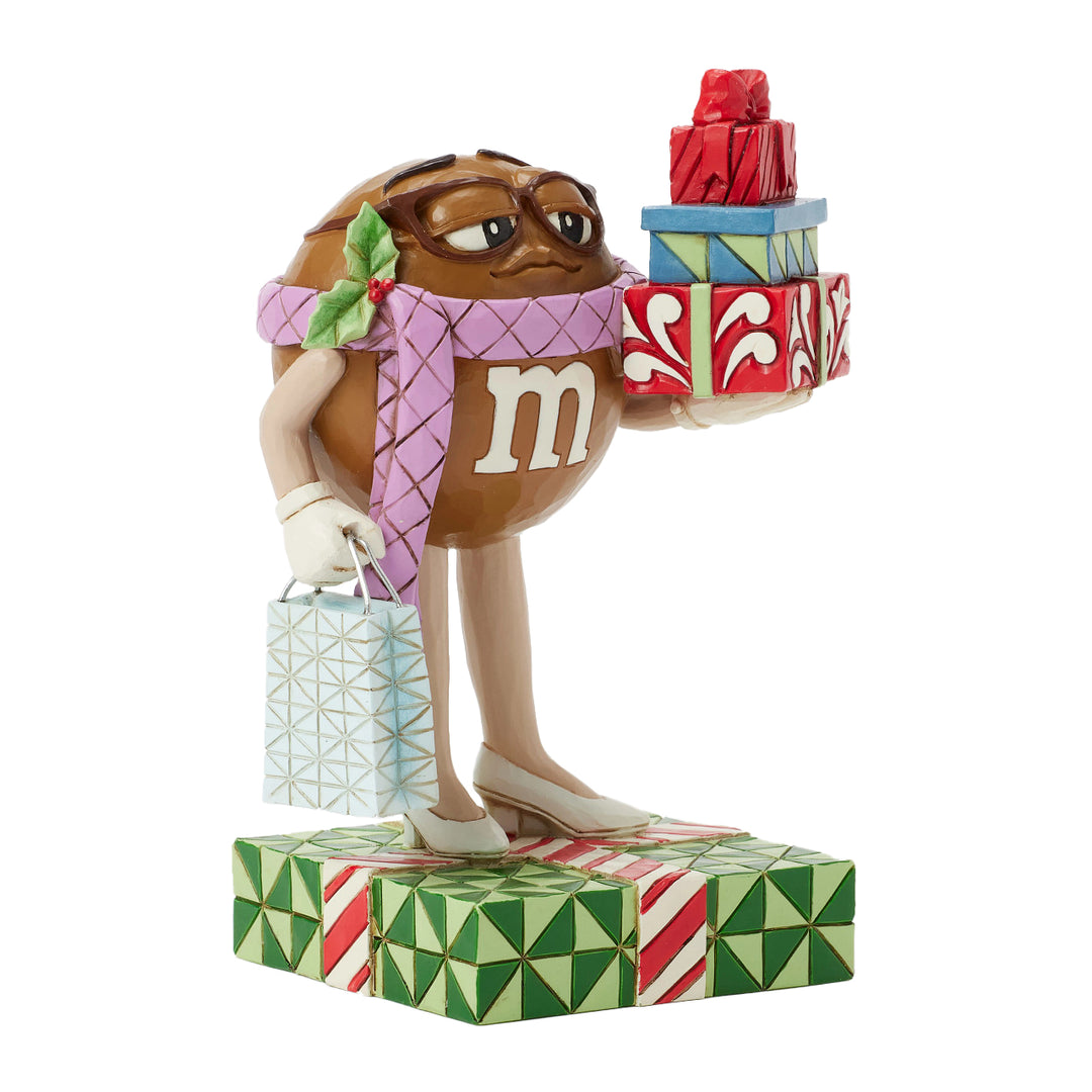 Jim Shore M&M'S: Brown M&M With Presents Figurine sparkle-castle