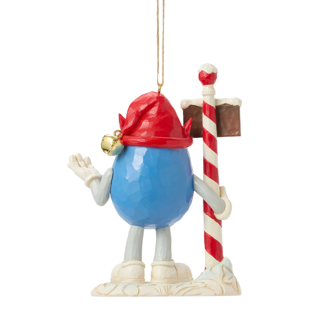 Jim Shore M&M's: Blue M&M With Strand by North Pole Sign Hanging Ornament