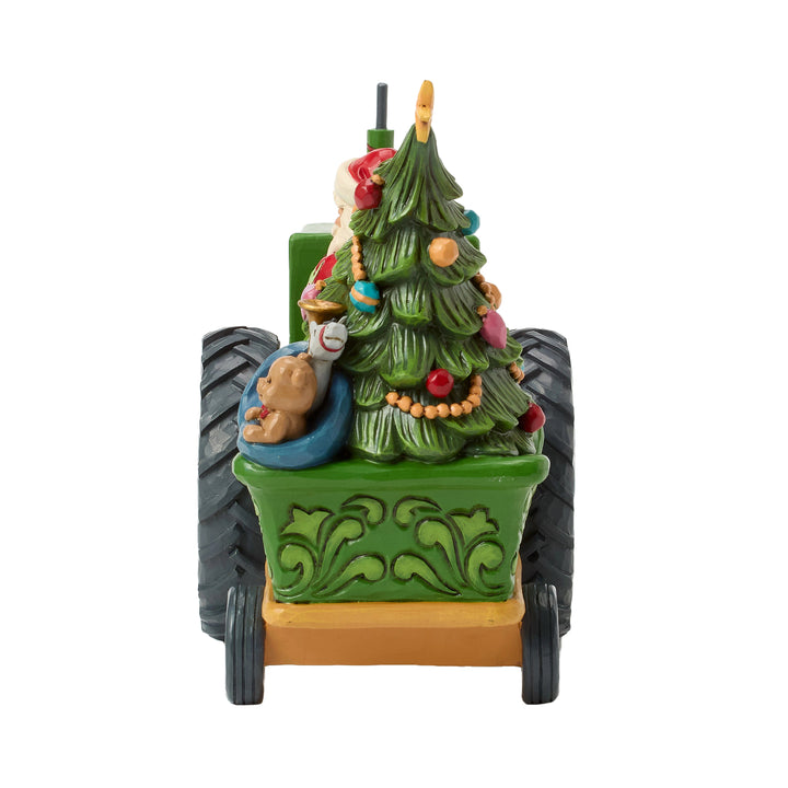 Jim Shore John Deere: Santa on Tractor with Toys Figurine sparkle-castle