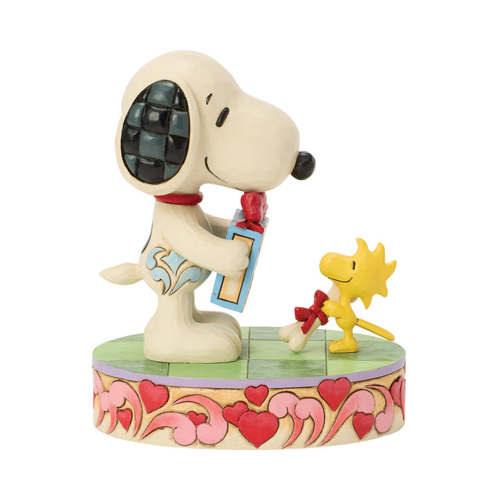Jim Shore Peanuts: Snoopy & Woodstock Exchanging Gifts Figurine sparkle-castle