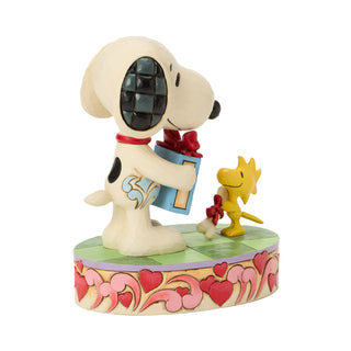 Jim Shore Peanuts: Snoopy & Woodstock Exchanging Gifts Figurine sparkle-castle