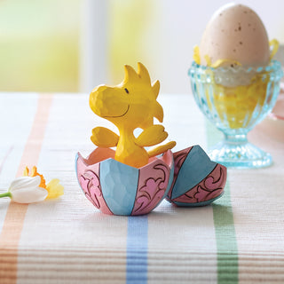 Jim Shore Peanuts: Woodstock Popping Out Of Easter Egg Miniature Figurine sparkle-castle